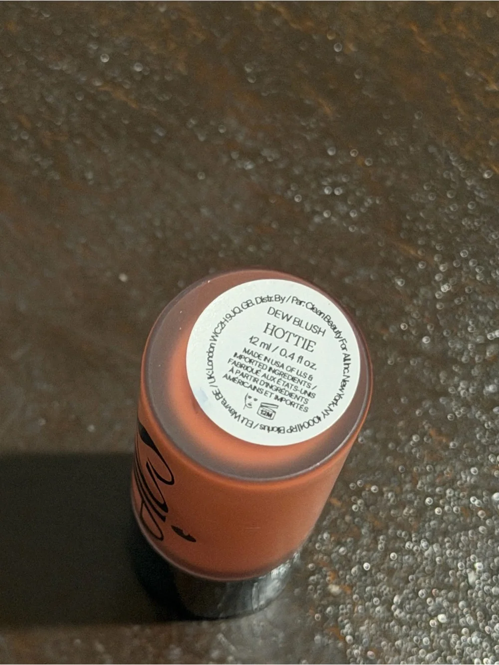 Saie Dew Blush Stick in Coral Peach shade hottie
